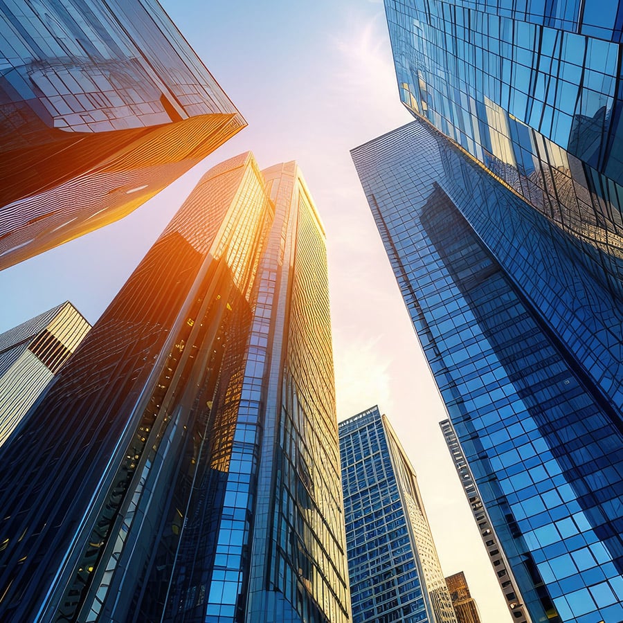 view of skyscrapers from below on a sunny day